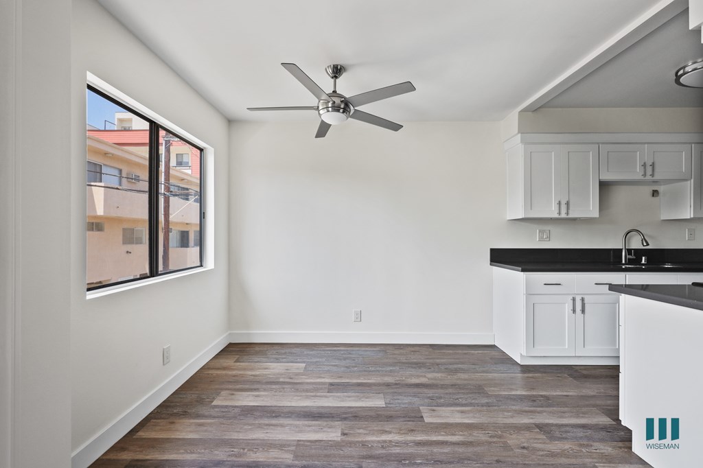 Dining Room with Large-Size Windows and Vinyl Flooring