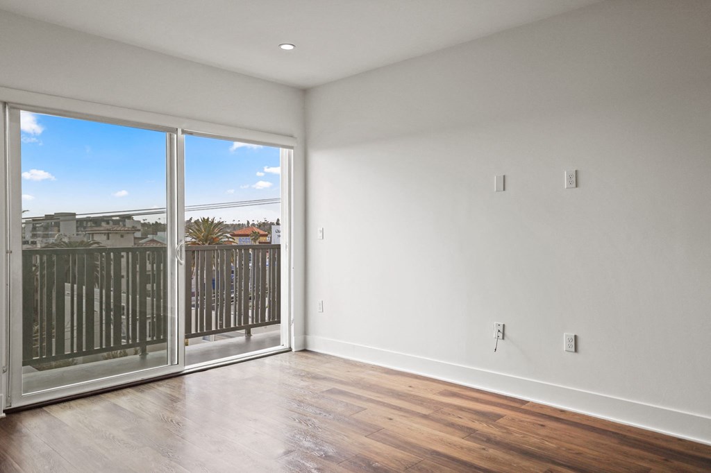 Living Room with a Balcony and City Views