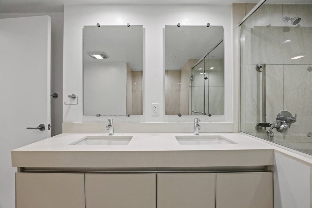 Bathroom with Double-Sink Vanity and Cabinet Storage