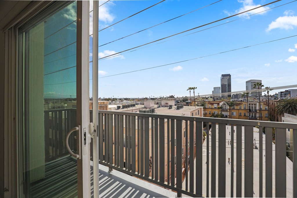 Upper Level Unit with a Patio with Views of the City