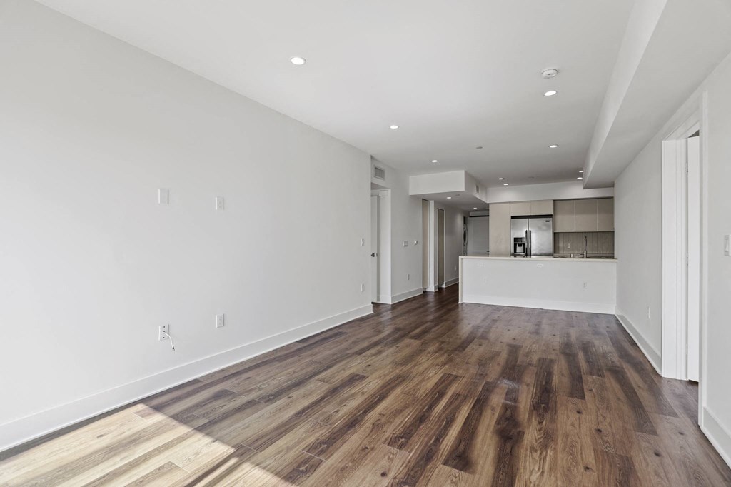 Living and Dining Room Area with Recessed Lighting and Vinyl Flooring
