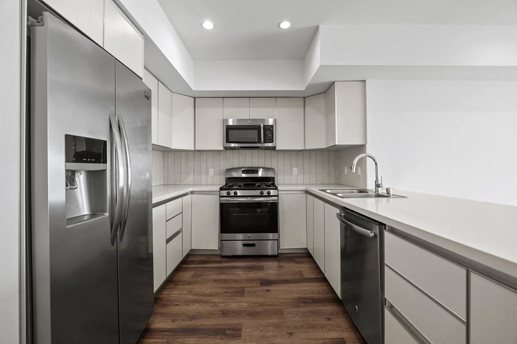 Kitchen with Energy-Efficient Refrigerator, Stove, Microwave Oven, and Dishwasher