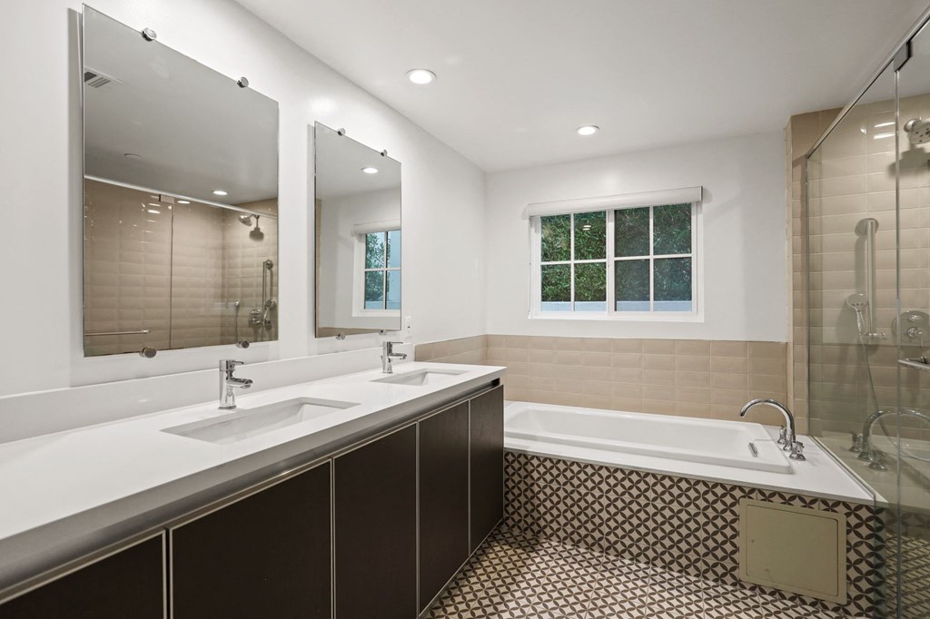 Full-Size Bathroom with Bathtub and Walk-In Shower