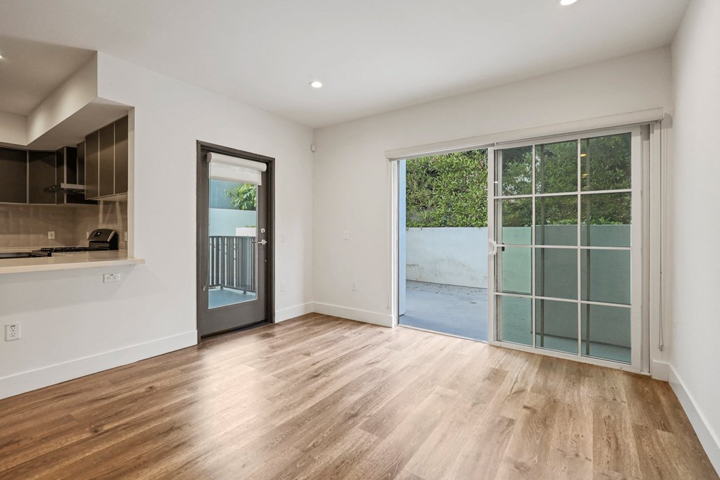 Living Room with Private Patio and Balcony