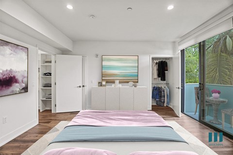 Large-Size Bedroom with Walk-In Closet with Shelving, Recessed Lighting, Vinyl Flooring, and Patio