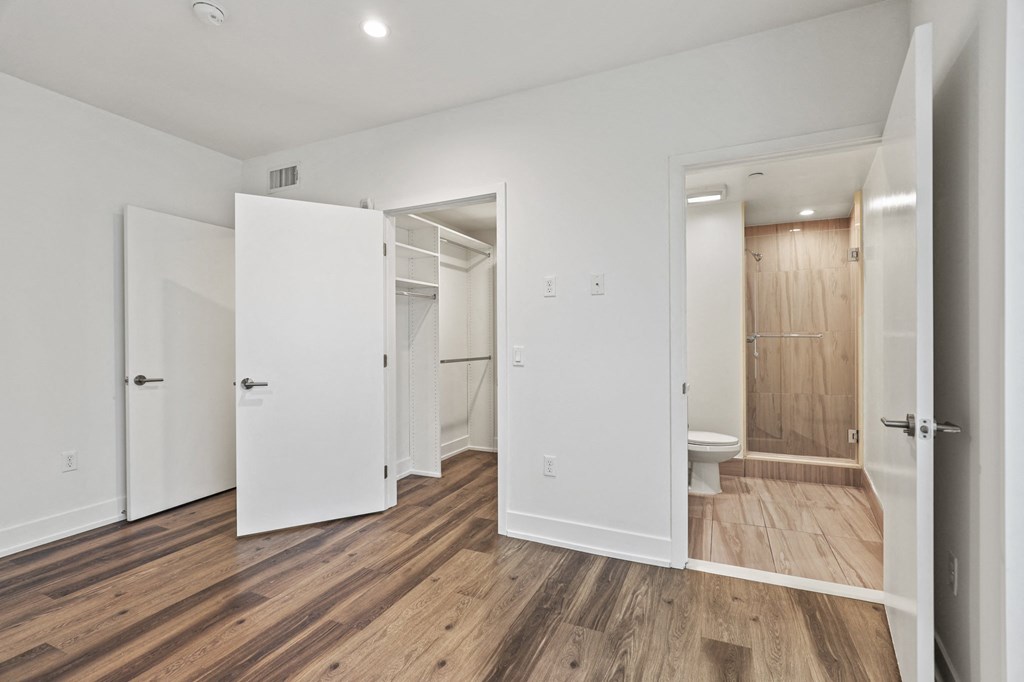 Bedroom with Bathroom and Walk-In Closet