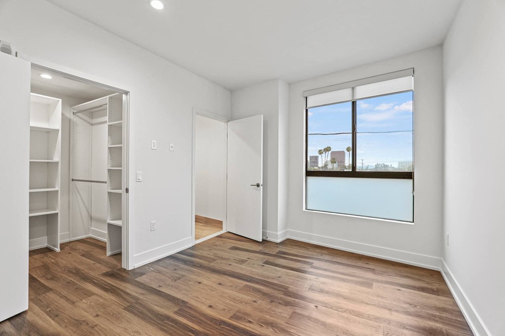 Bedroom with Bathroom and Walk-In Closet with Built-In Organizers