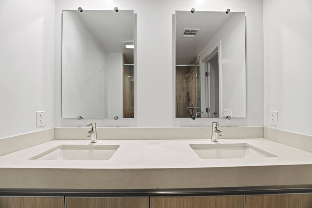 Bathroom with Double-Sink Vanity and Cabinet Storage