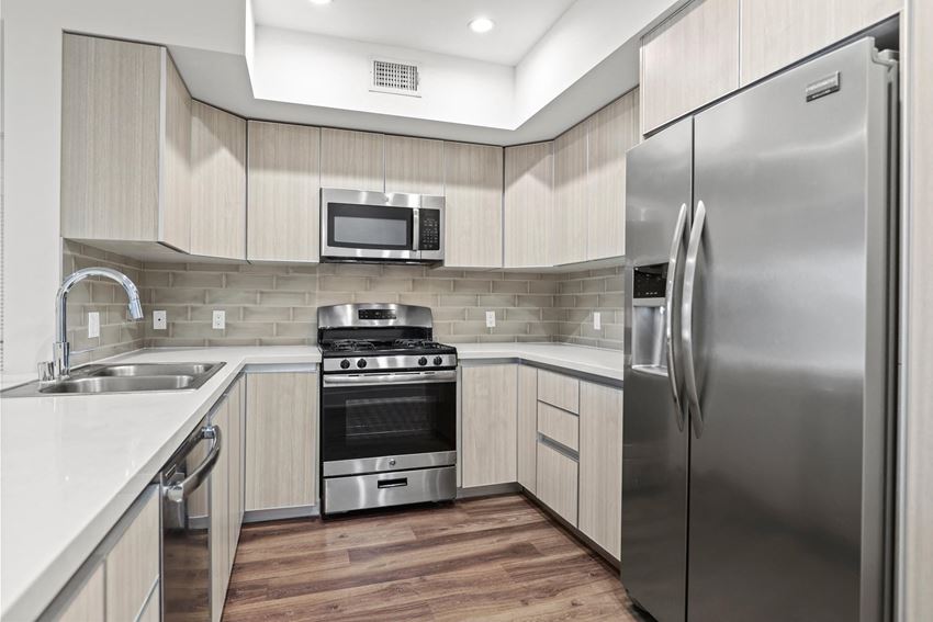 Kitchen with Stainless Steel Appliances and Ample Cabinet Storage Kitchen with Stainless Steel Appliances and Ample Cabinet Storage