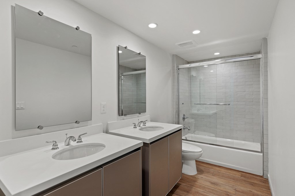 Bathroom with Double Vanity and Shower Bath with Glass Door