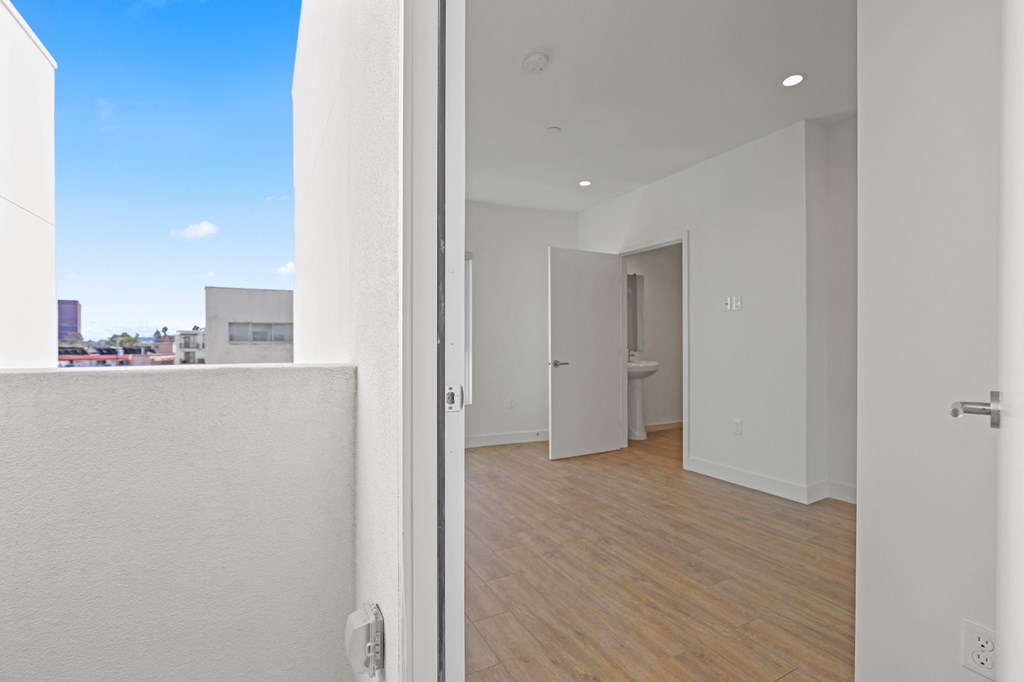 Patio View of a Bedroom with a Bathroom