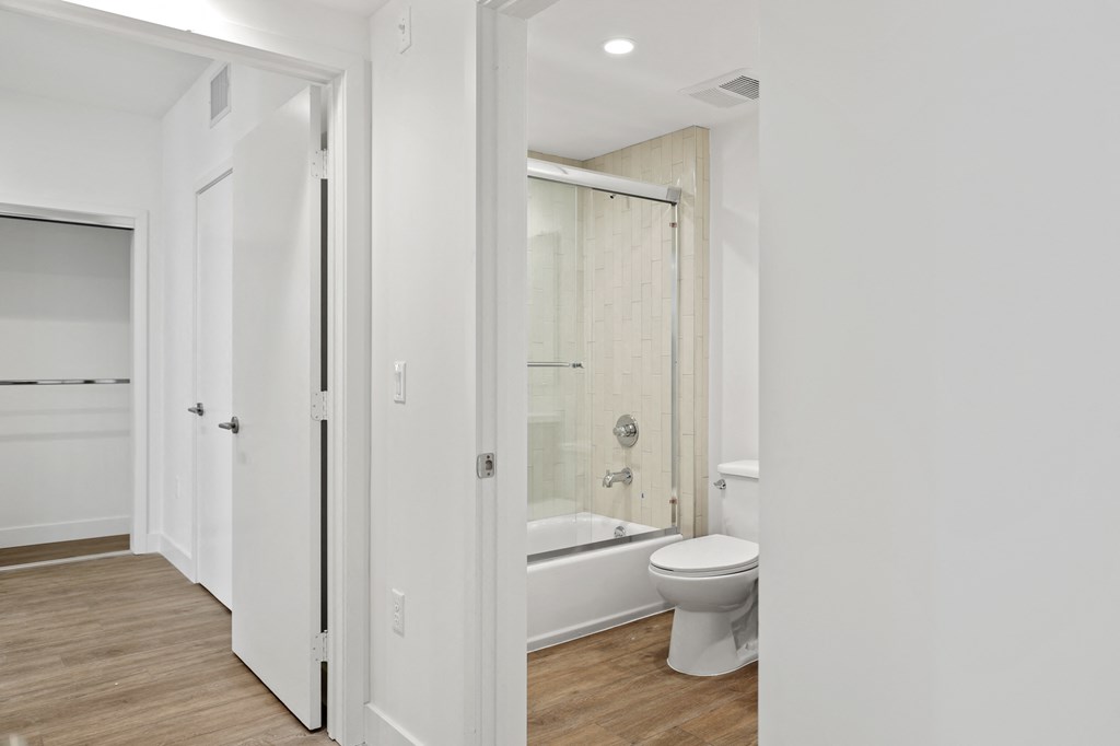 Bedroom and a Bathroom with Shower Bath