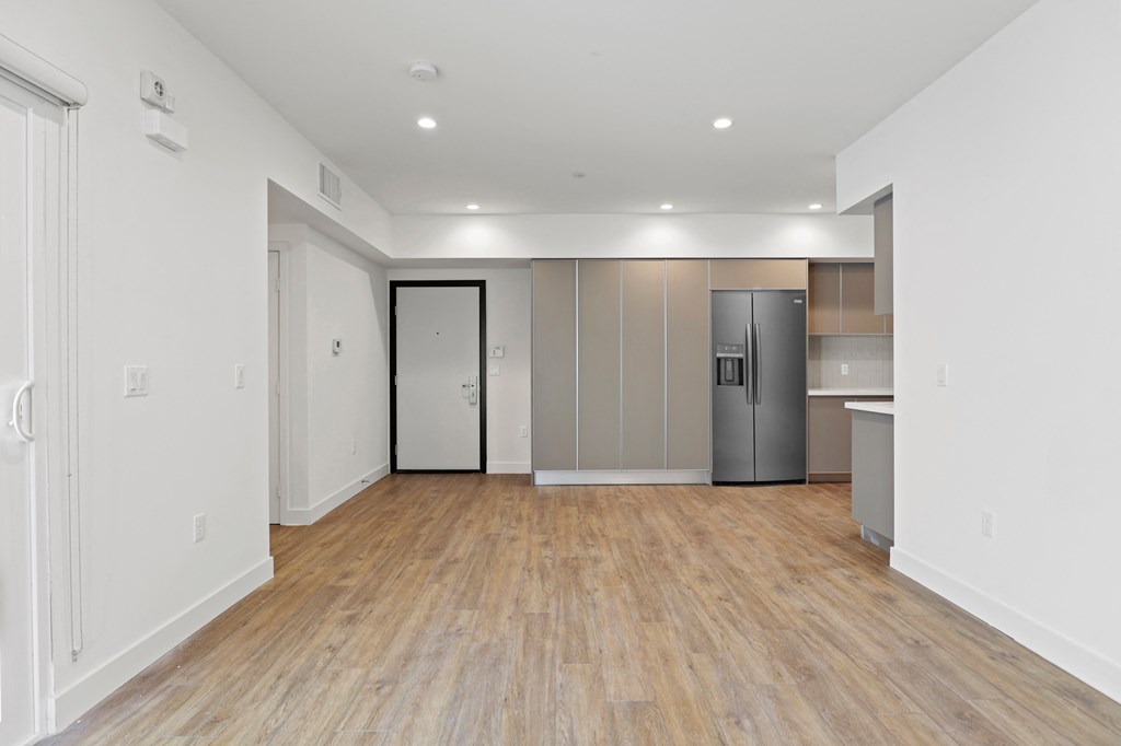 Front Entrance and Open-Concept Kitchen  and Dining Areas