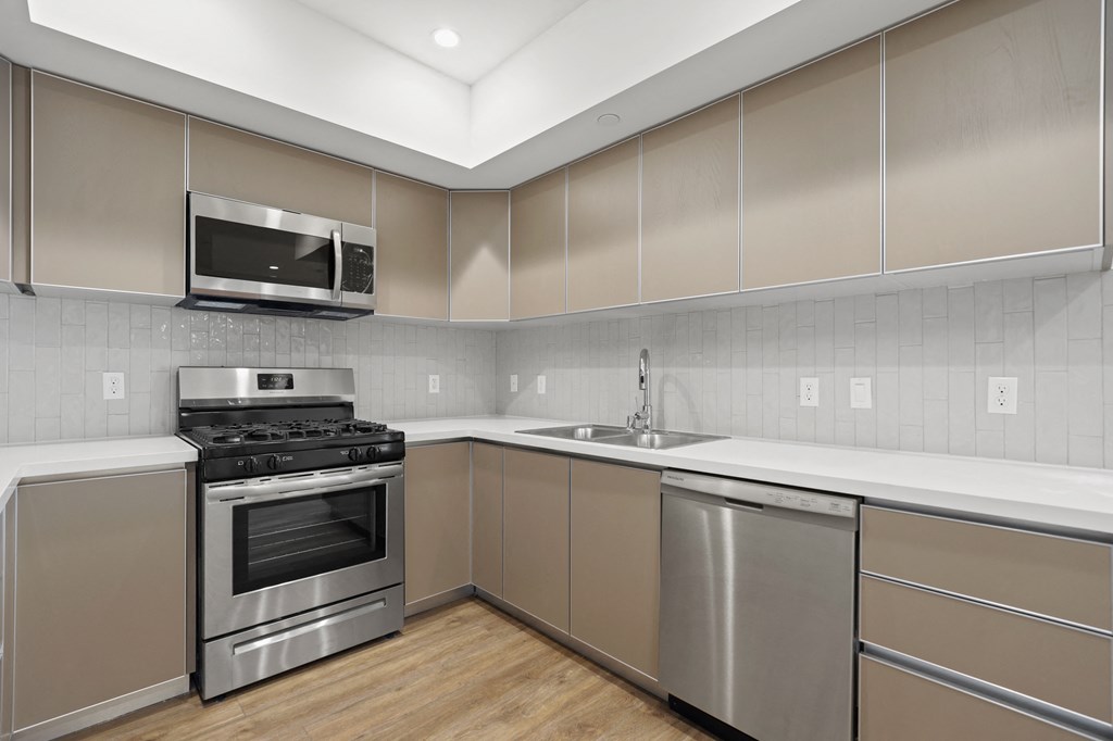 Kitchen with Stainless-Steel Stove, Microwave Oven, and Dishwasher