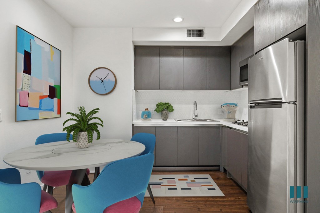 Kitchen with Stainless-Steel Appliances and Dining Area