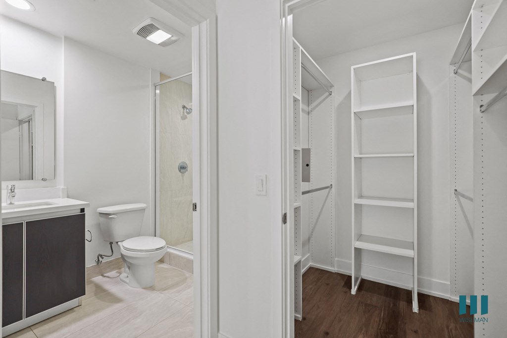 Bedroom with Bathroom and Walk-In Closet with Shelving