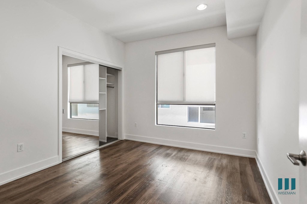Bedroom with Vinyl Flooring, Recessed Lighting, and Window