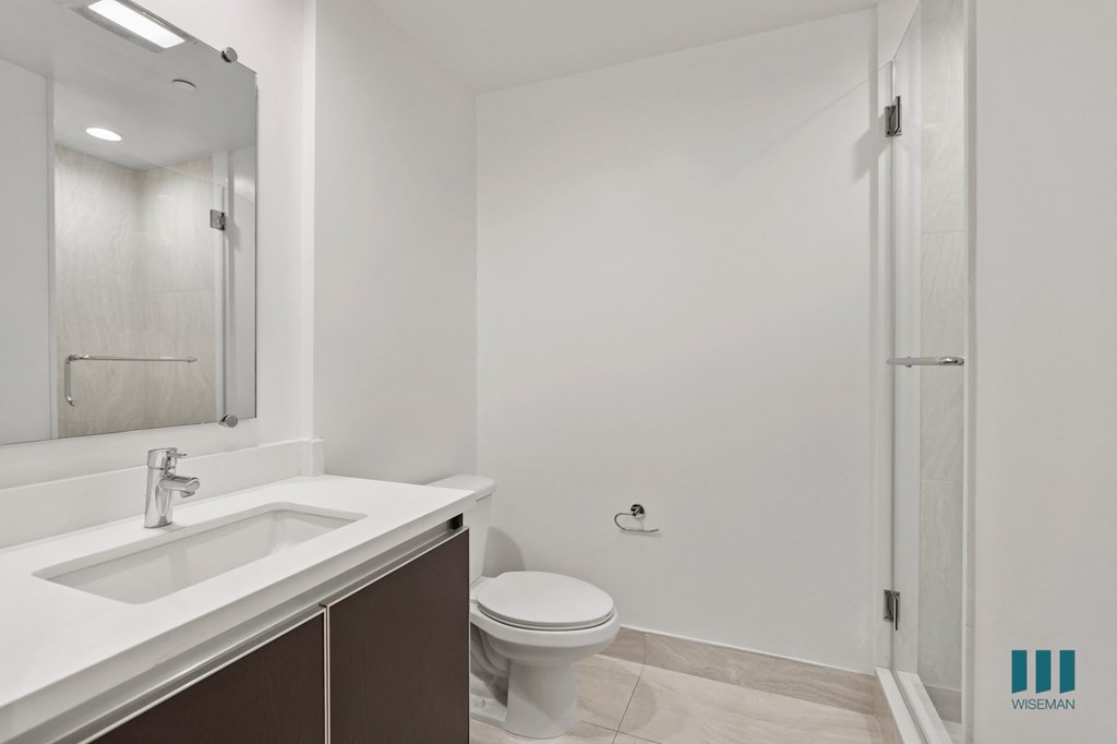 Bathroom with Stand-Up Shower and Glass Door