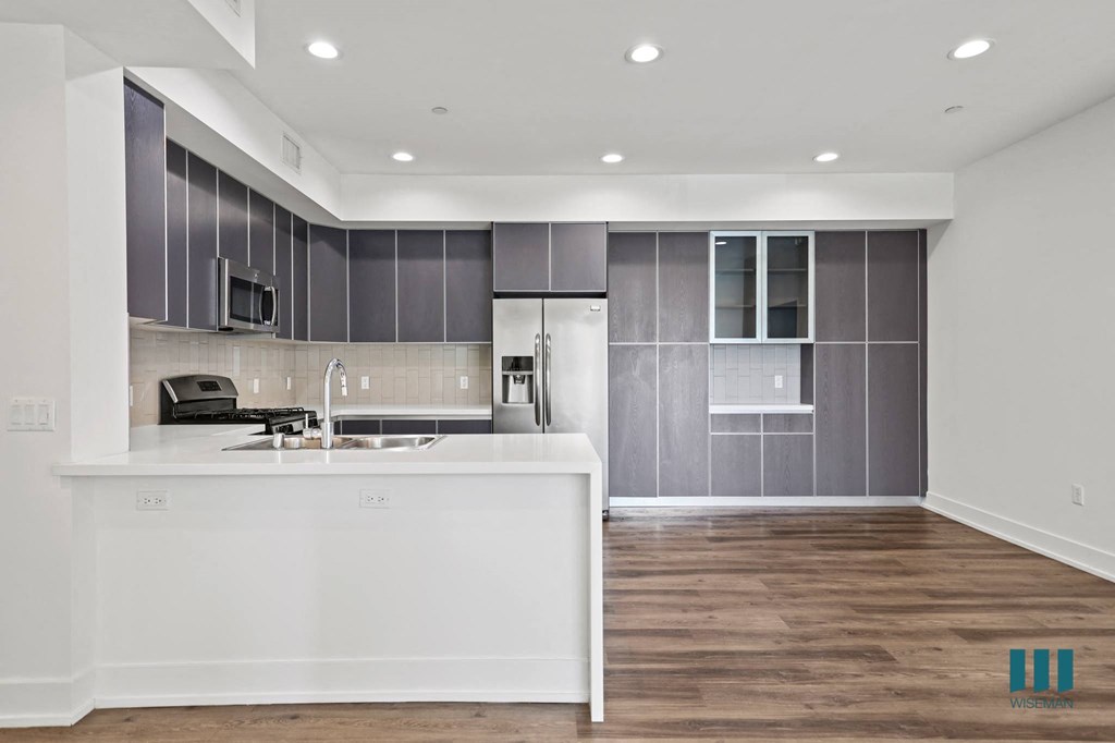 Open-Concept Kitchen and Dining Area with Cabinet Storage