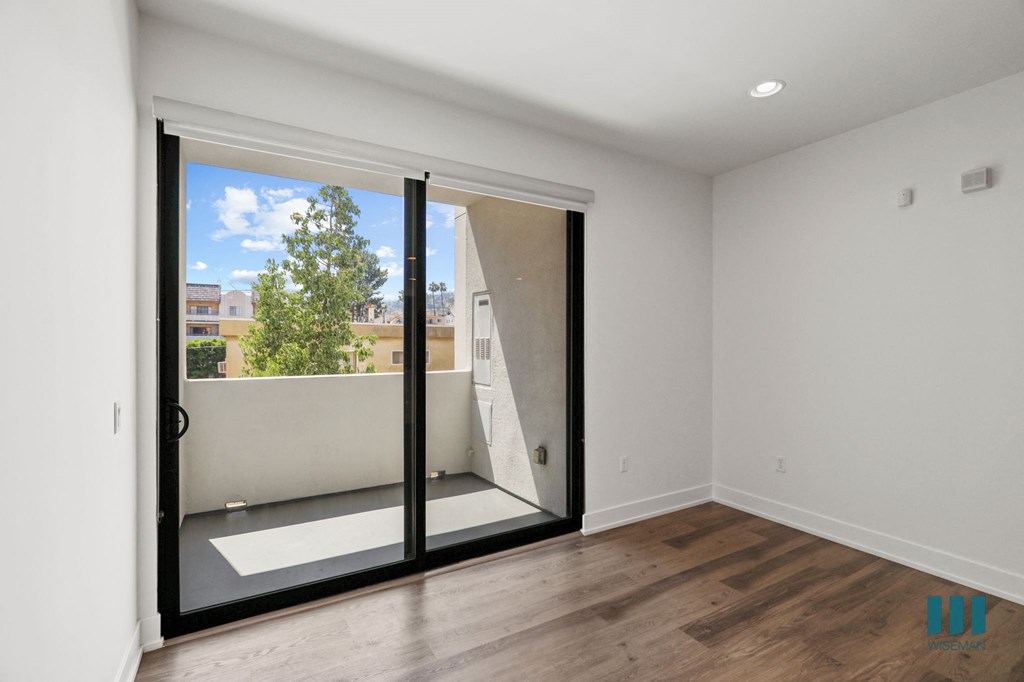 Living Room with Patio with Built-In Shade