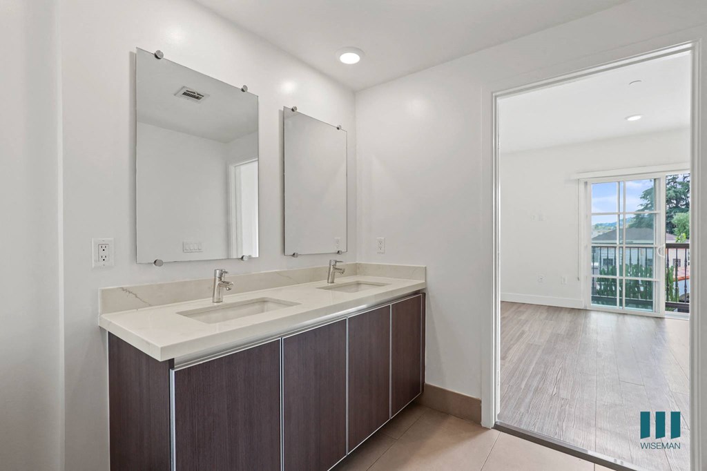 Bedroom with Patio and Bathroom with Double-Sink Vanity
