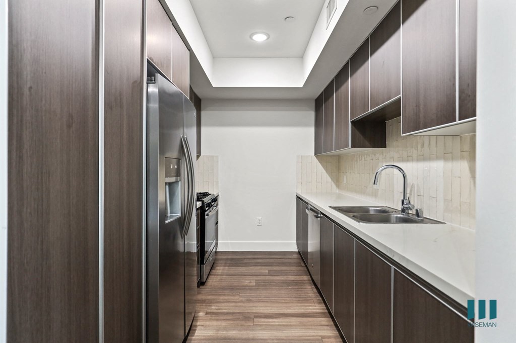 Kitchen with Stainless Steel Appliances and Ample Cabinet Storage