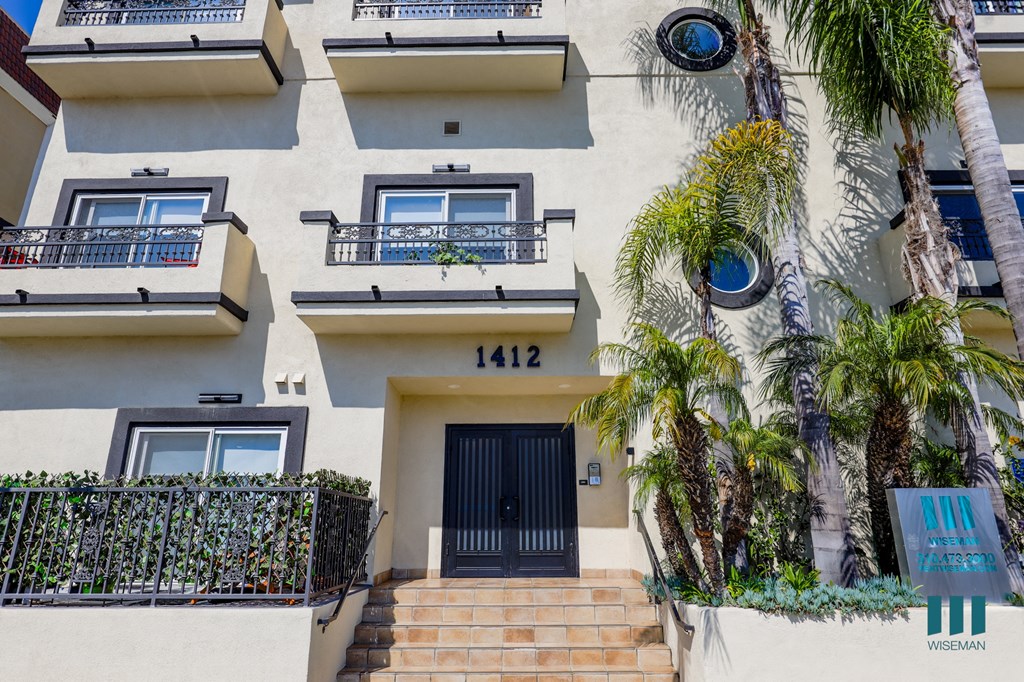 Sidewalk View of Front Entrance of Colby Villa s