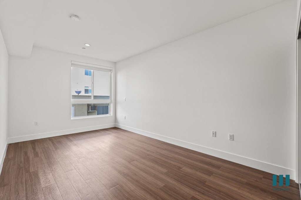 Bedroom with Vinyl Flooring, Recessed Lighting, and Windows
