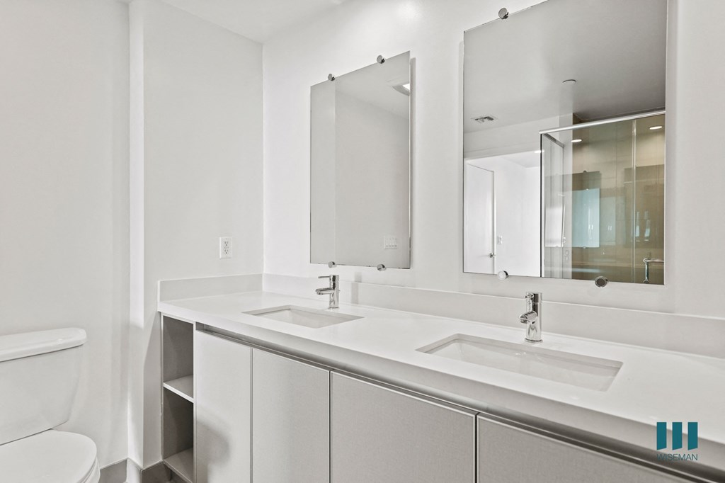 Bathroom with Double-Sink Vanity with Cabinet Storage