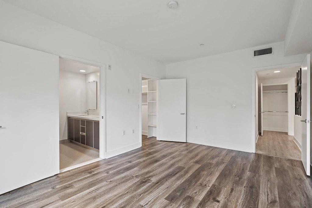 Bedroom with Bathroom and Walk-In Closet with Shelves
