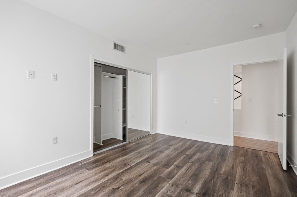 Bedroom with Closet with Shelving
