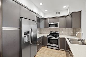 Kitchen with Energy-Efficient Appliances and Ample Cabinet Storage