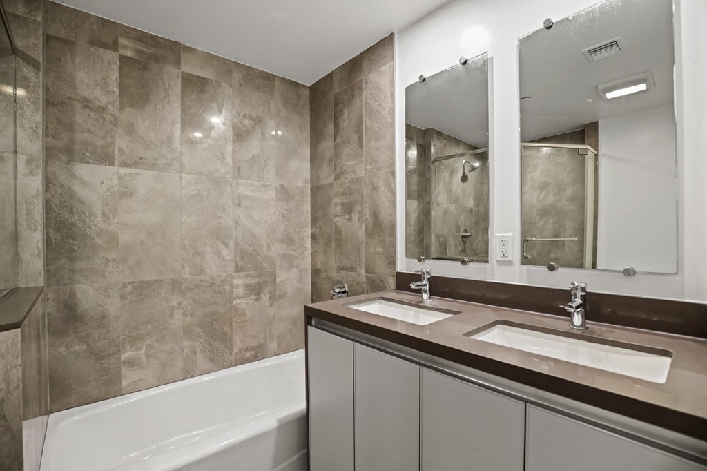 Bathroom with a Double-Sink Vanity and a Full-Size Bathtub
