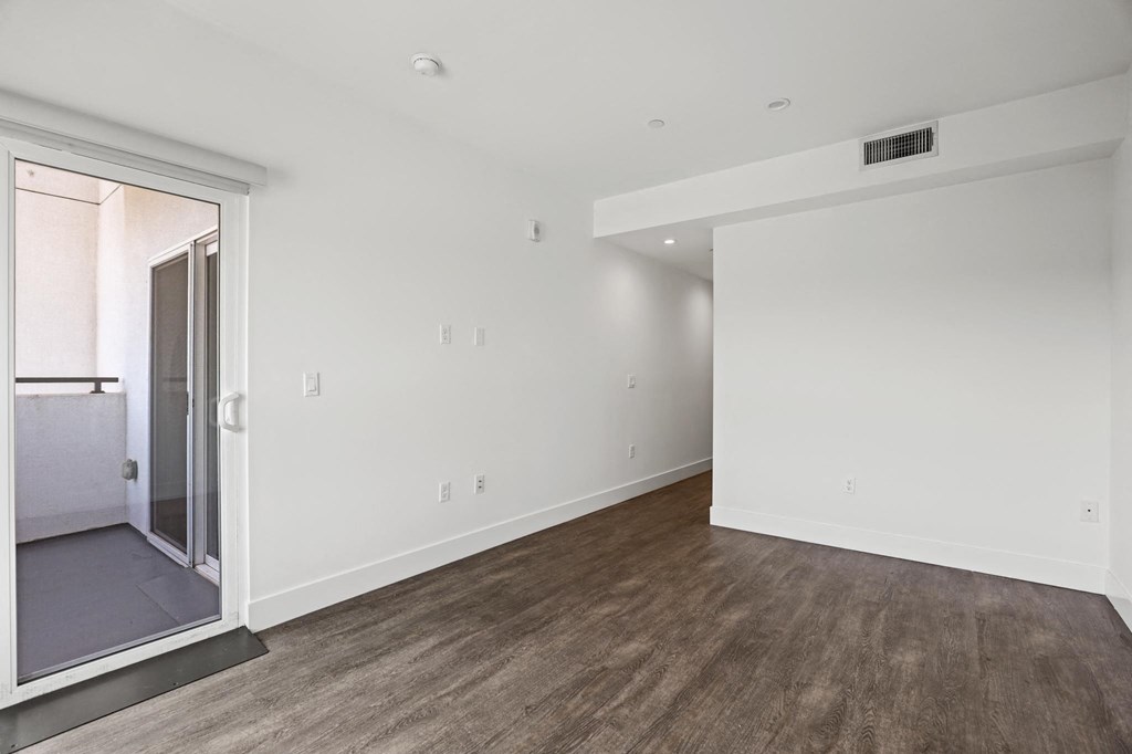 Bedroom with Patio, Vinyl Flooring, and Recessed Lighting