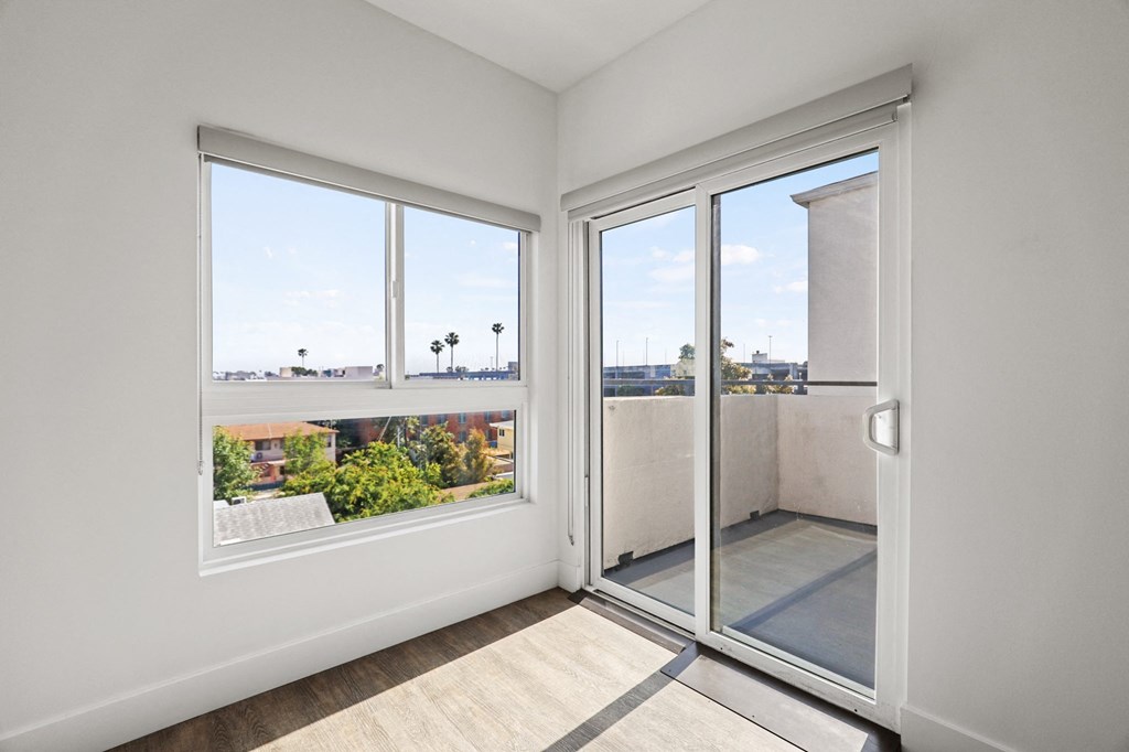 Large Windows and Patio off of the Living Room