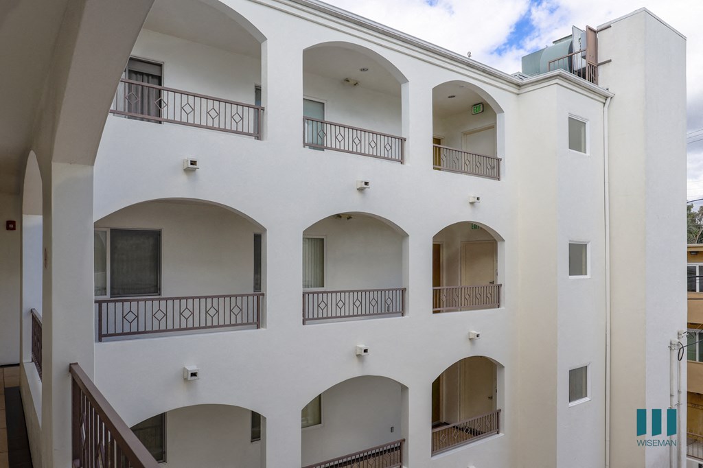 a view of the balconies on the side of a building
