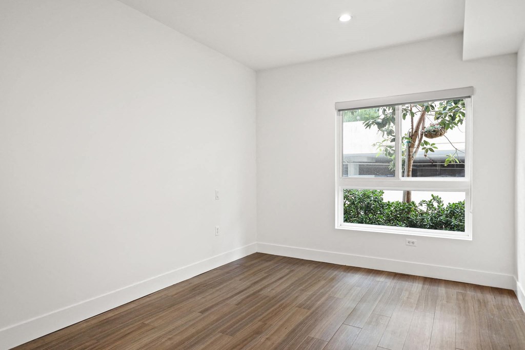 Bedroom with Recessed Lighting, Vinyl Flooring, and Large-Size Windows