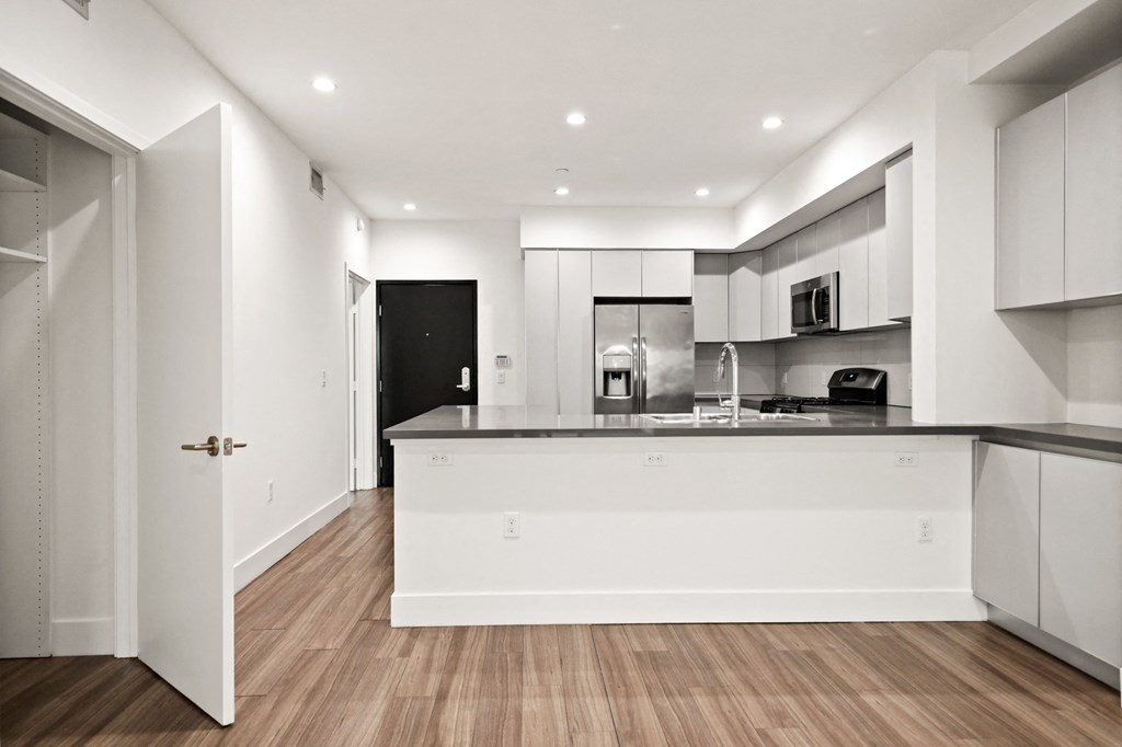 Open-Concept Kitchen and Hall Storage Closet
