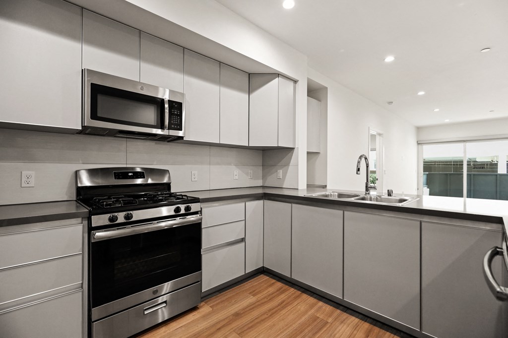 Kitchen with Energy-Efficient Appliances and Ample Cabinet Storage