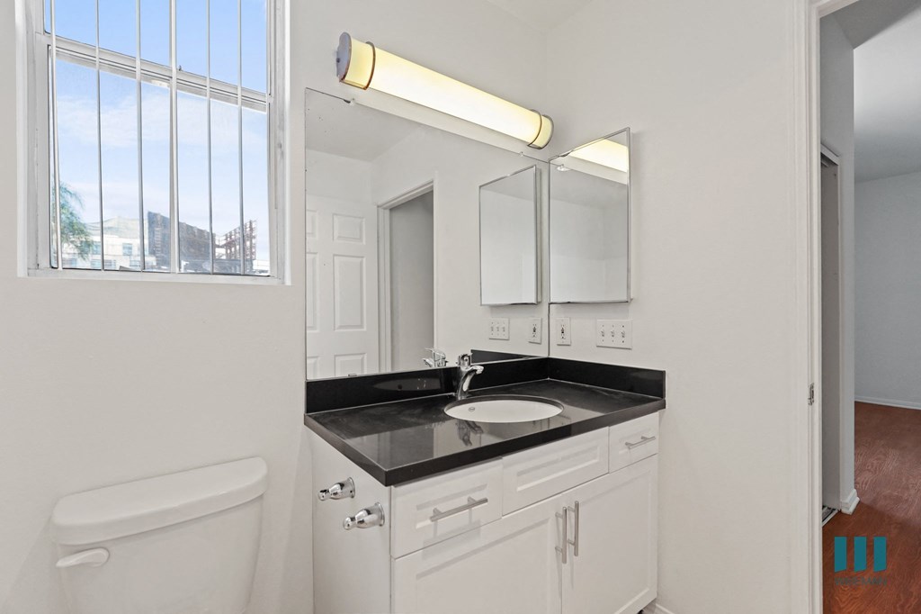 Bathroom with Vanity Cabinet Storage and Window