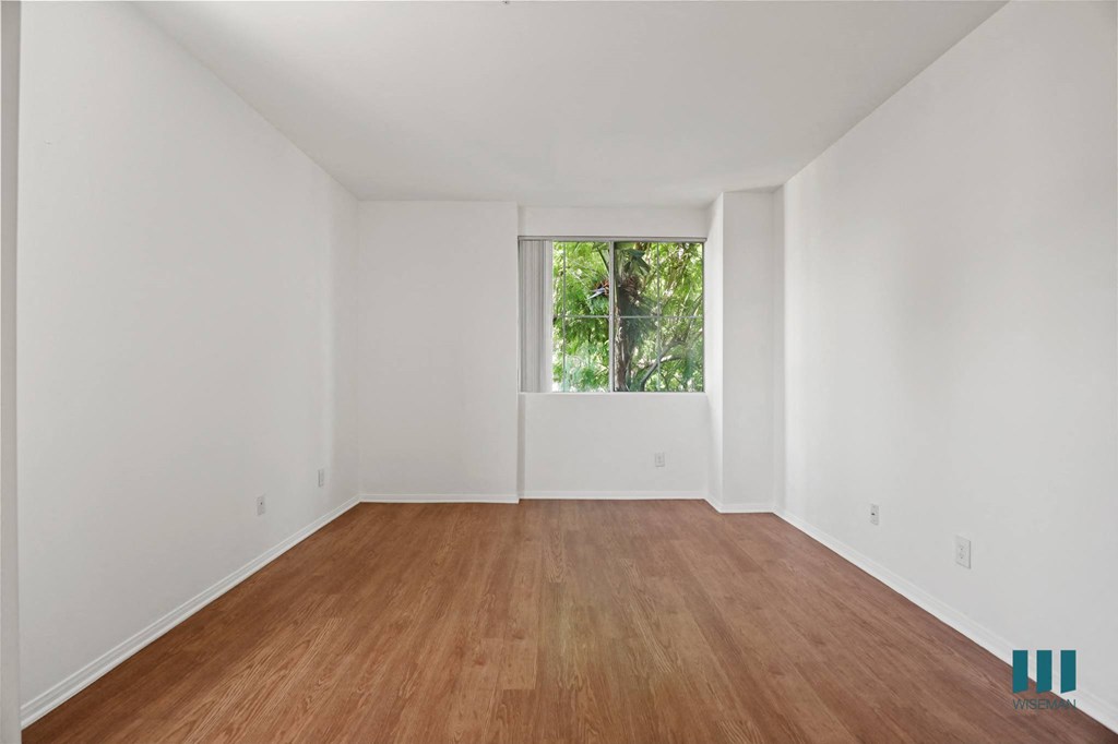 Bedroom with Window and Vinyl Flooring