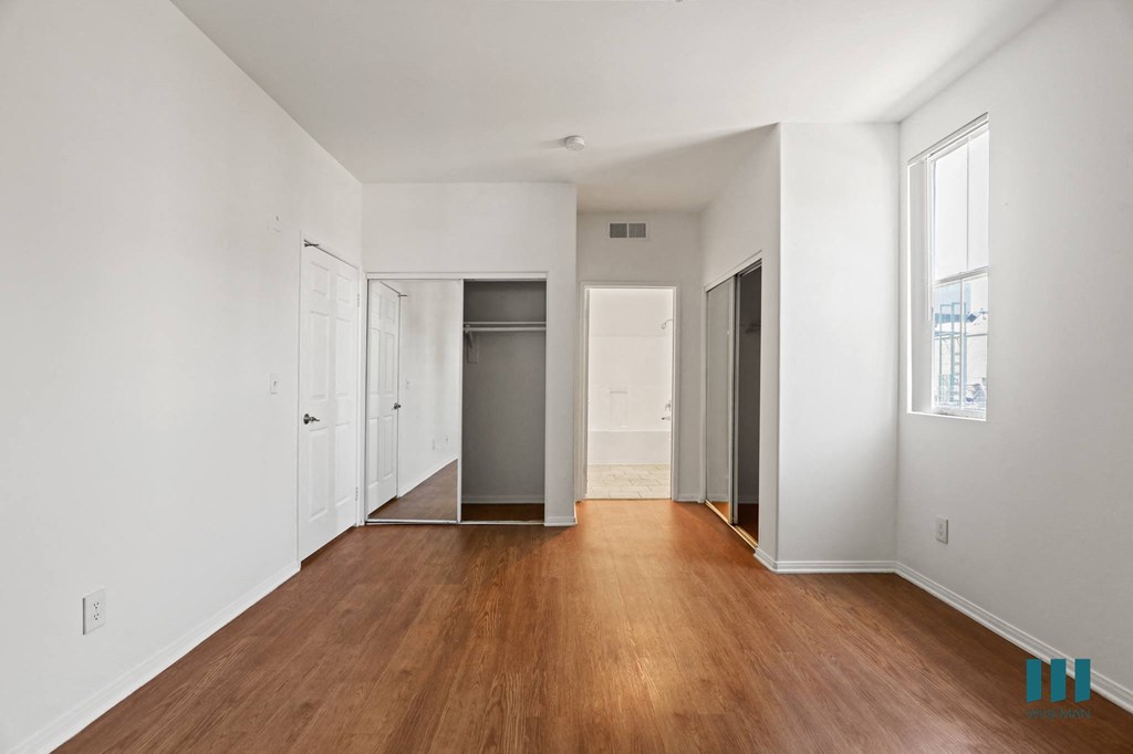 Bedroom with  Bathroom and Double Closets