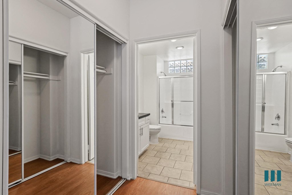 Bedroom with Full-Size Bathroom and Multiple Closets