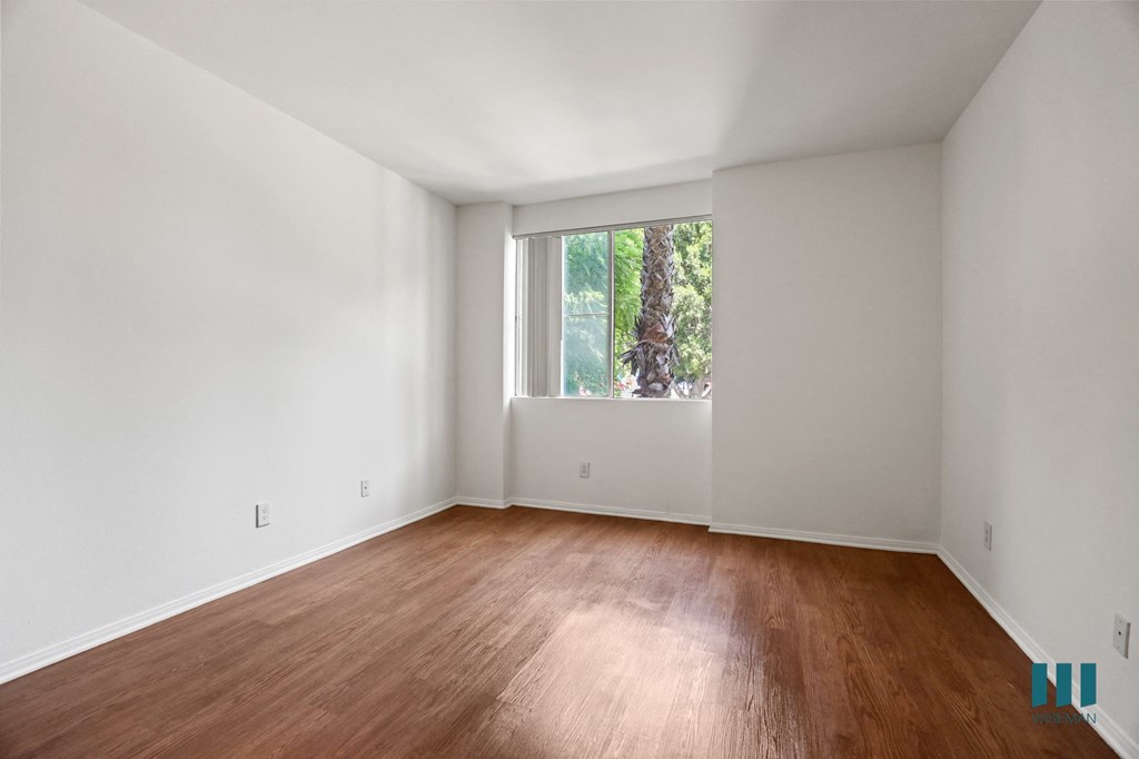 Bedroom with Windows and Vinyl Flooring