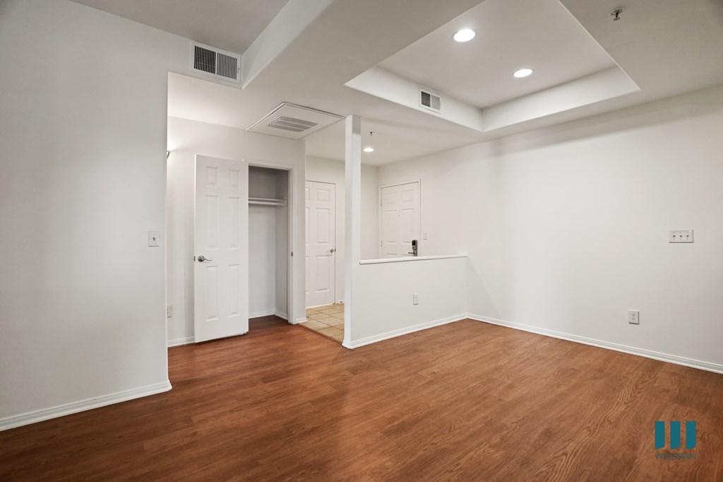 Front Entrance with Hall Closet, Vinyl Flooring, and Recessed Lighting