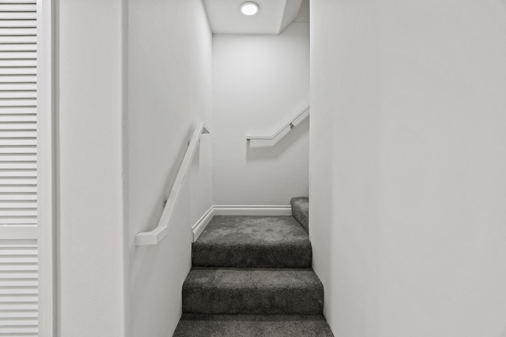 Staircase to Upper Level of Apartment Home