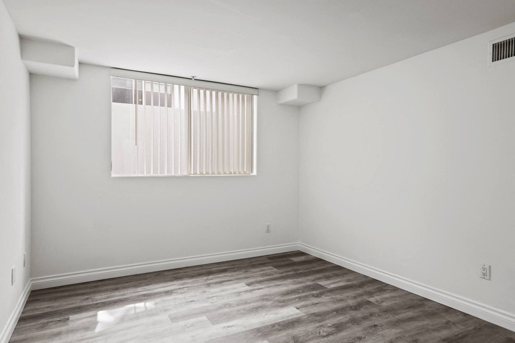 Bedroom with Vinyl Flooring and Large-Size Window