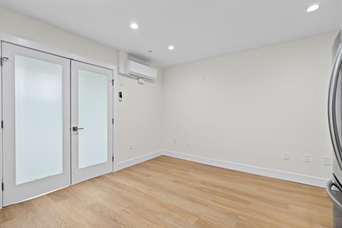 Dining or Living Room Space with Recessed Lighting and Vinyl Flooring