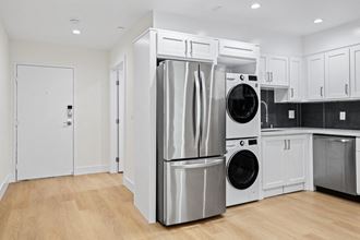 Front Entrance of Unit and In-Suite Washer & Dryer