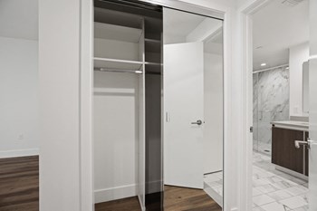 Bedroom with Mirrored Closet with Shelving, and Bathroom - Photo Gallery 49